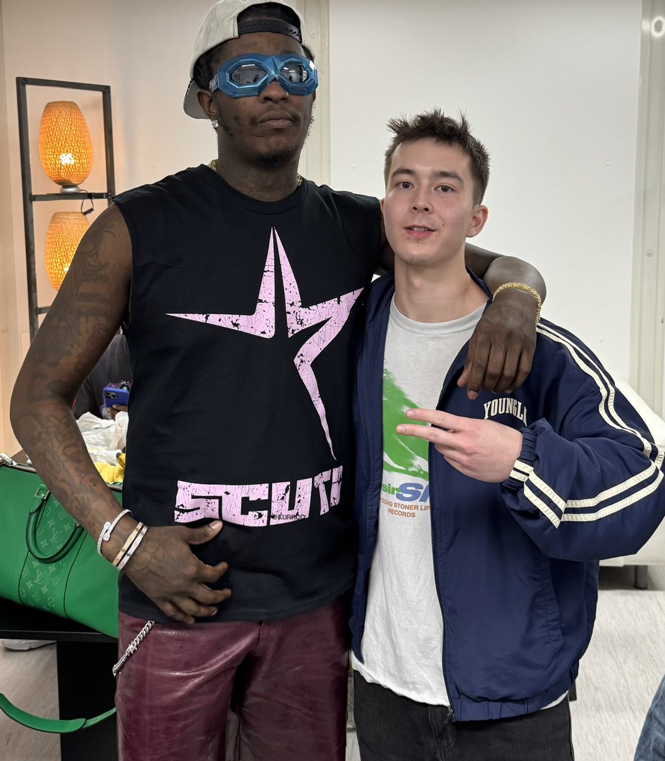 Young Thug & his team surprised a fan who drove 9 hours to see him live by inviting him backstage for a photo and even paying for his gas 🐍🔥